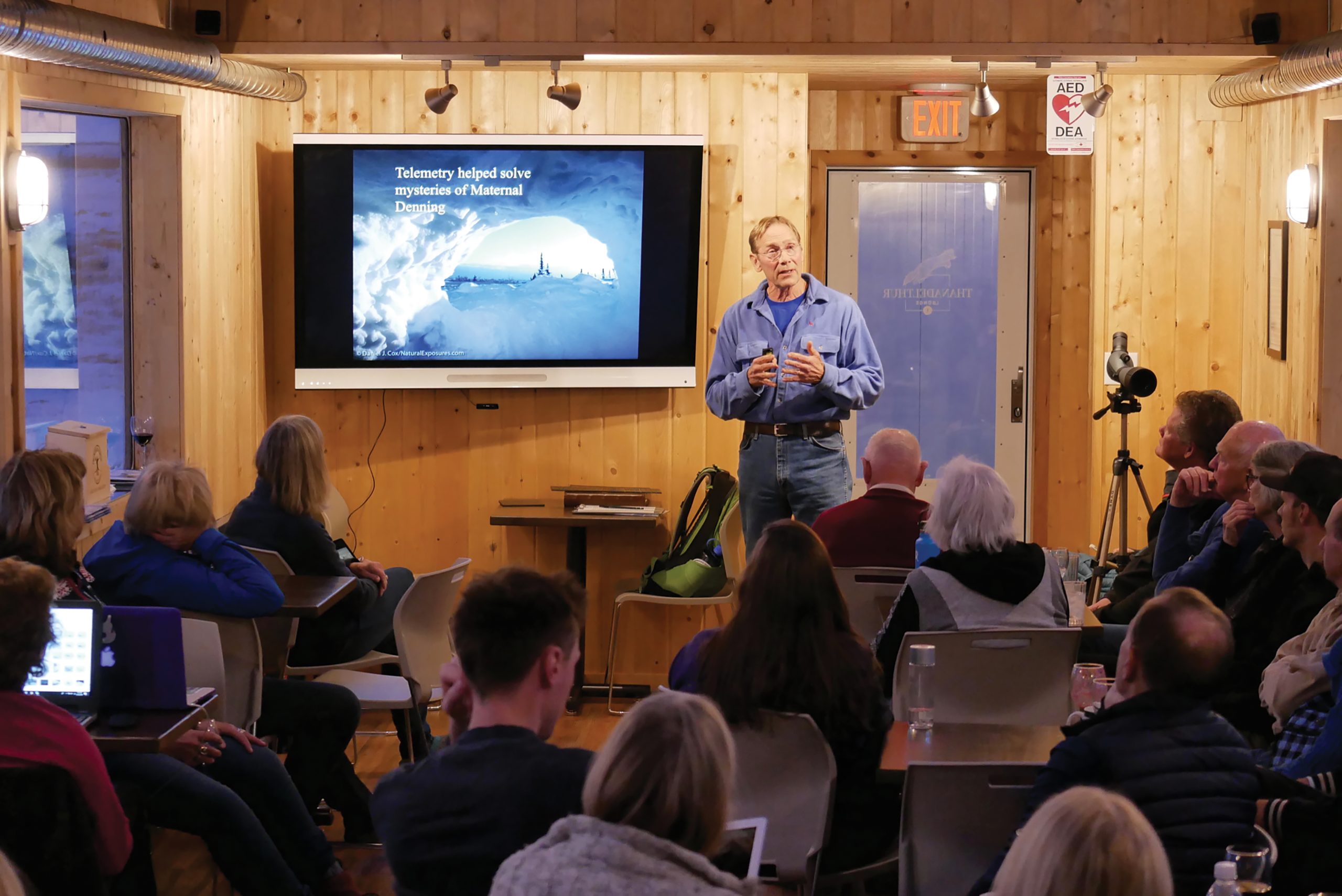 Crediting is required when using Frontiers North's photos. This means you have to credit both the photographer and Frontiers North Adventures using the following convention: © Photographer's Name/Frontiers North Adventures.
Image Caption:
A Polar Bears International representative presenting to guest in Thanadelthur Lounge at the Tundra Buggy Lodge.
